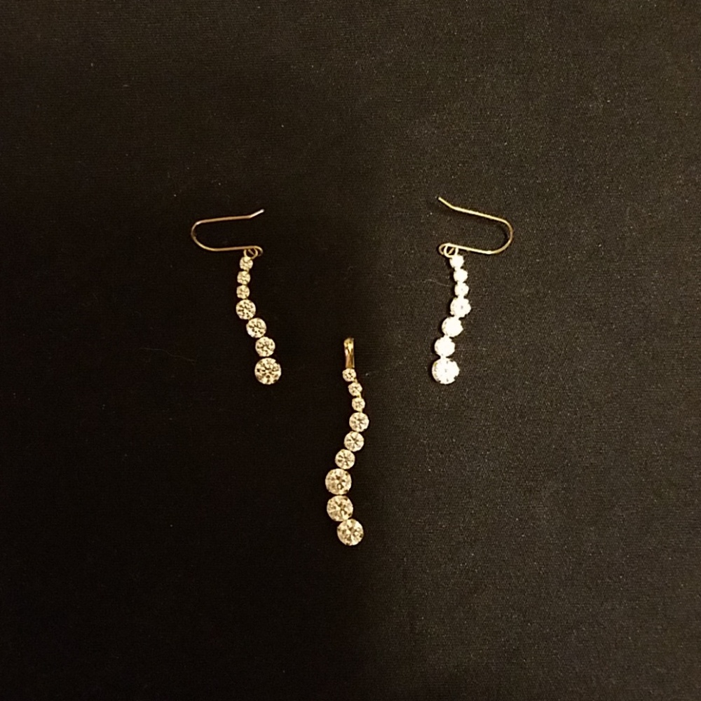 Absolute CZ pendant and earring set in 14K gold.